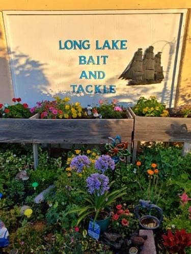 A photograph of Long Lake Bait & Tackle's storefront sign.
